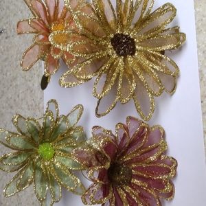 Four Floral Napkin Holders